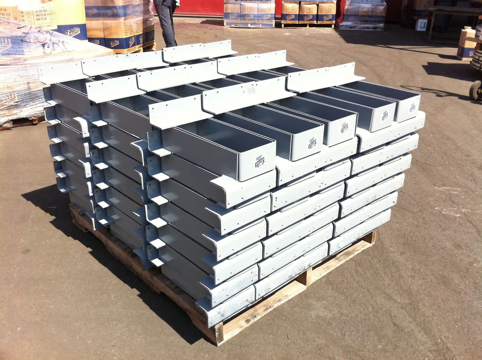 Pallet of painted Tobin Steel hangers ready to ship
