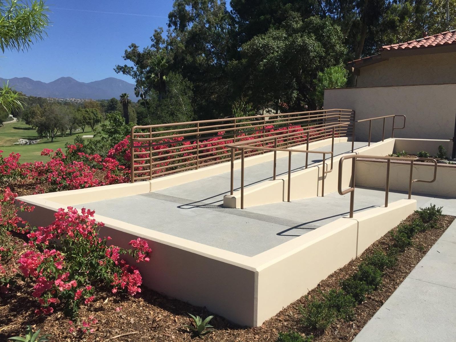 Finished ramp handrails and guardrails at a clubhouse